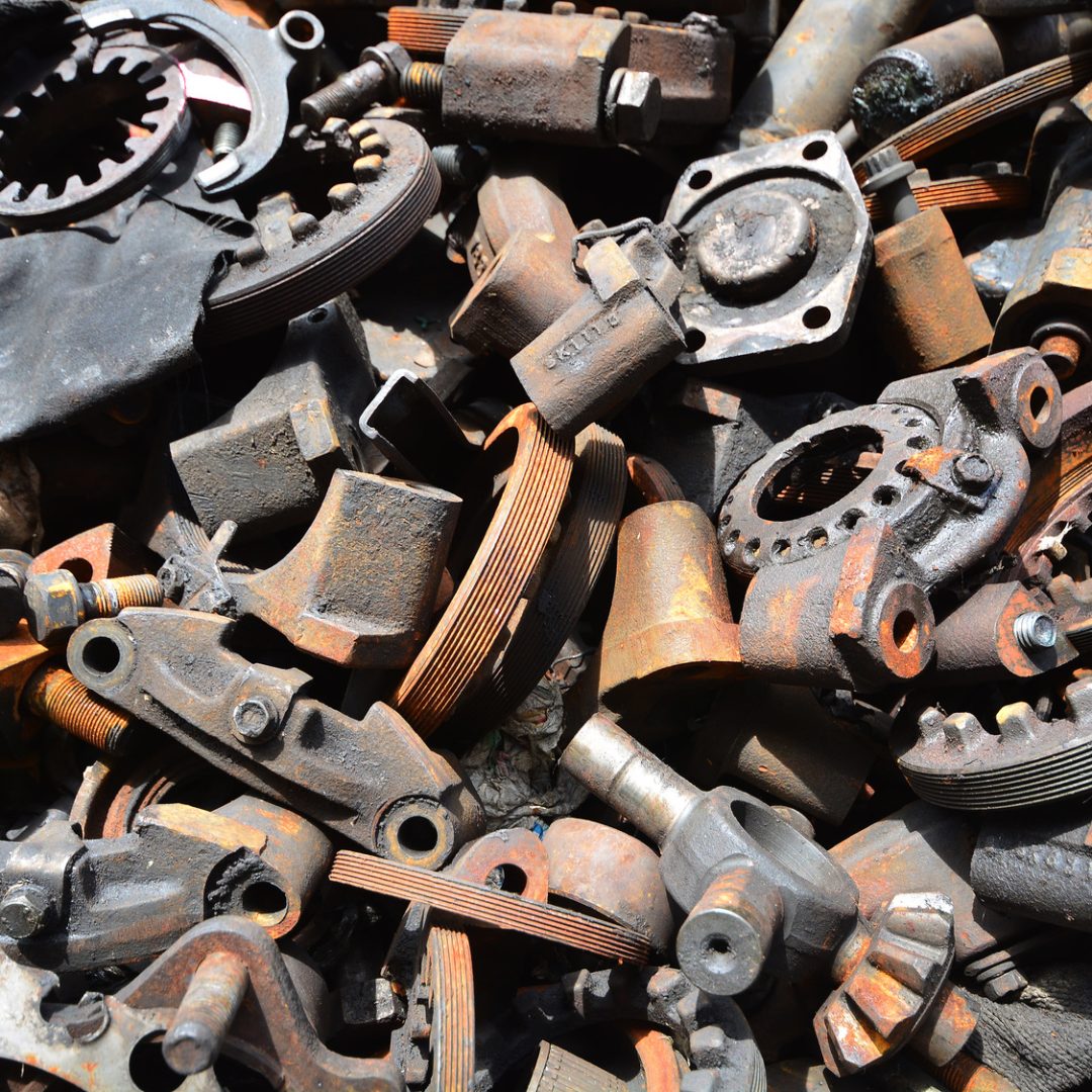 Pile of old motor parts scrap metal for recycling